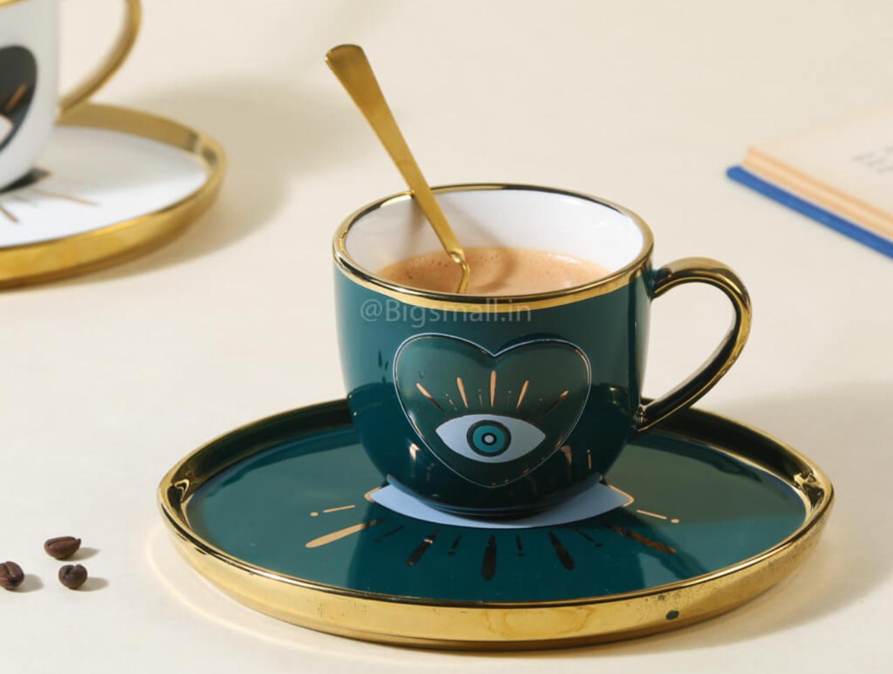 Evil Eye Coffee Cub with a Plate and Spoon