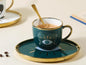 Evil Eye Coffee Cub with a Plate and Spoon