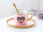 Evil Eye Coffee Cub with a Plate and Spoon